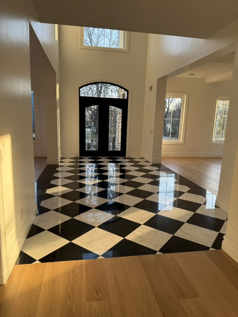 Two-Story Grand Marble Foyer - The High Street Estate