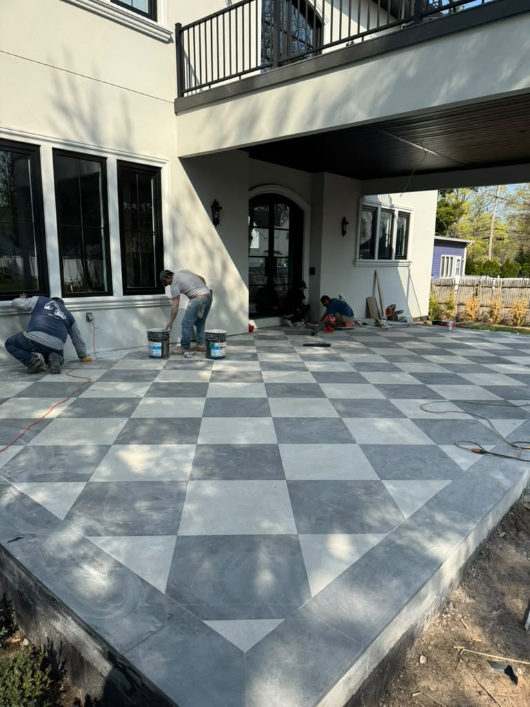 Custom Exterior Patio with Geometric Masonry - The High Street Estate